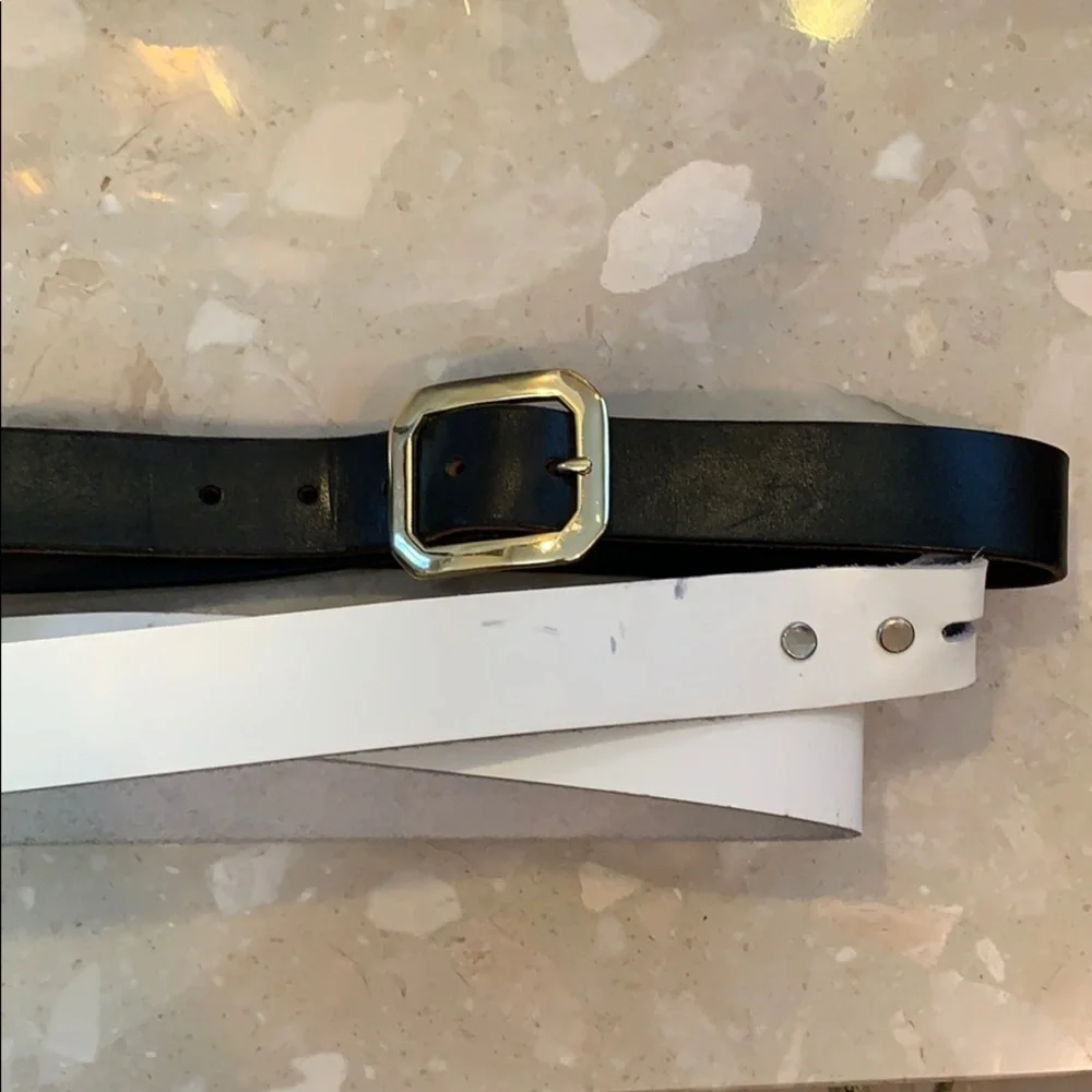 Black and white leather belts